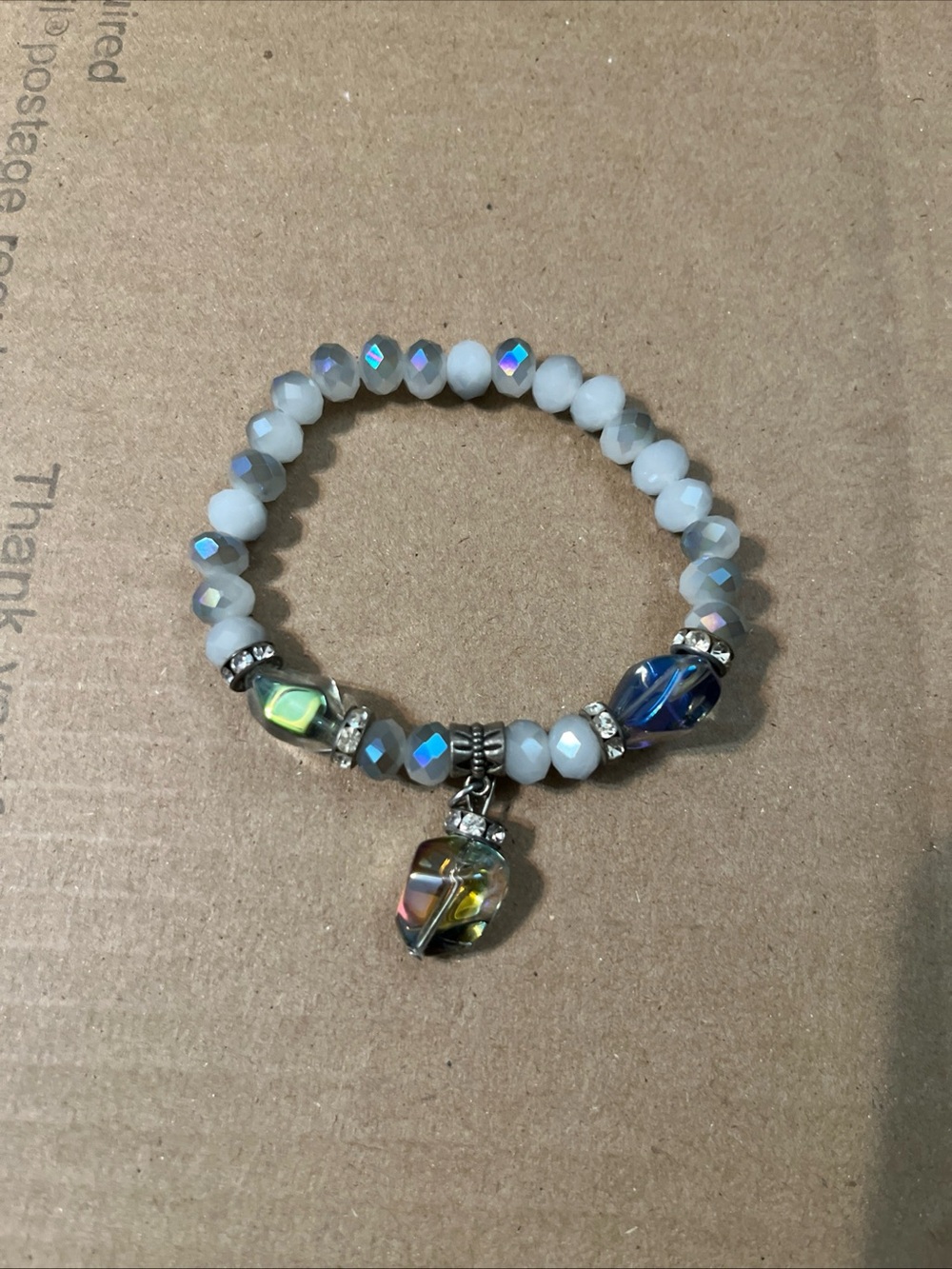 Iridescent White Beaded Stretch Bracelet with Crystal Charm